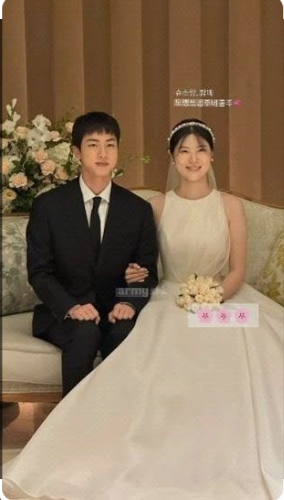 BTS member Jin attending his cousin's wedding.